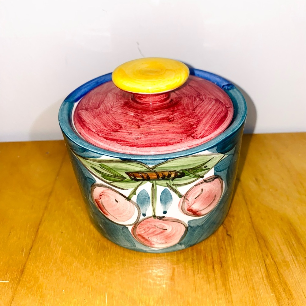 Fruita De Roma canister with a lid, featuring a hand-painted fruit design.